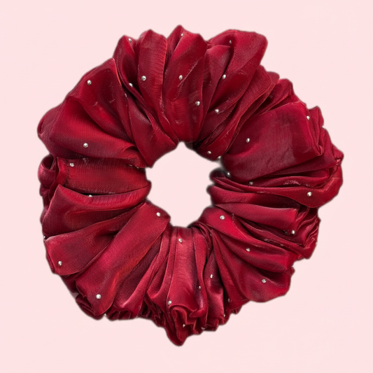 Flat lay top view of Étoile Lumière burgundy scrunchie